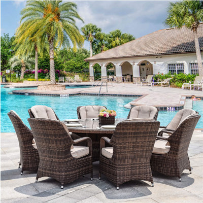 Parma 9-Piece Outdoor Dining Set with Round Table in PE Wicker and Cushions by Abrihome