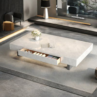 Simple rectangular rock slab floating coffee table by Creature B Comforts