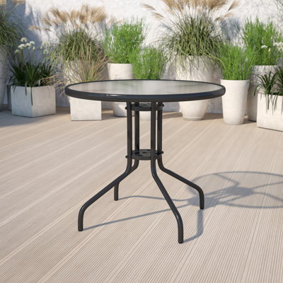 Amlie 31.5" Round Tempered Glass Metal Table with Smooth Ripple Design Top by Wade Logan