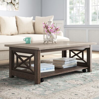 Alim 4 Legs Coffee Table with Storage by Lark Manor