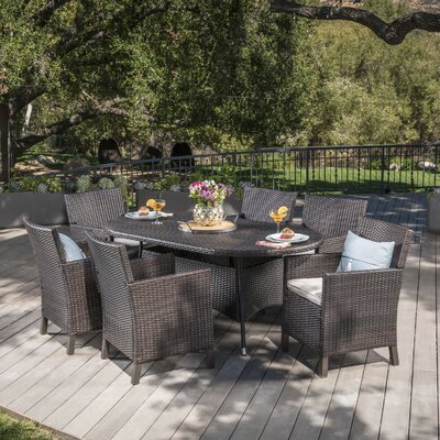 Basabi Outdoor Wicker 7 Piece Dining Set with Cushions by Wade Logan