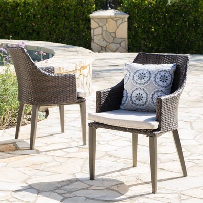 Backlund Wicker Patio Dining Chair with Cushion by Ivy Bronx