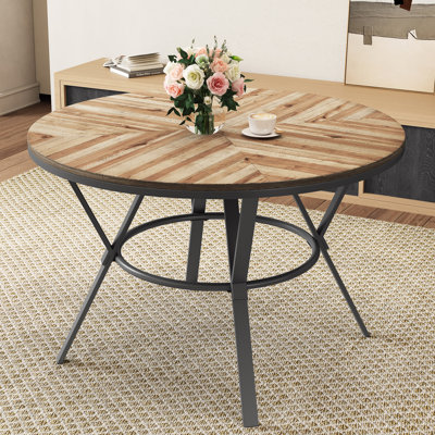 Manthey Faux Wood Round Dining Table by George Oliver