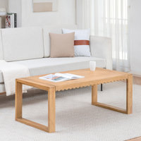 Leidesdorff 48" Solid Wood Rectangular Coffee Table with Scalloped Edges by George Oliver