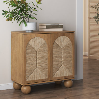Coran Boho Storage Cabinet with Ball-Style Feet and Seagrass Door Panels by Bay Isle Home