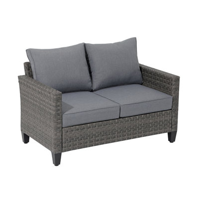 Wicker Outdoor Loveseat with Cushions by OC Orange-Casual