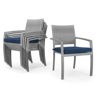 Ehrenfried Stacking Patio Dining Armchair With Sunbrella Cushion Covers by George Oliver