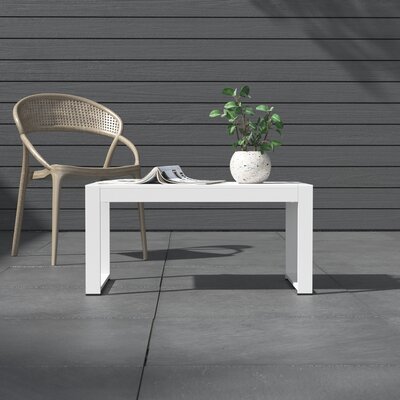 Aynura Plastic Coffee Table by Wade Logan