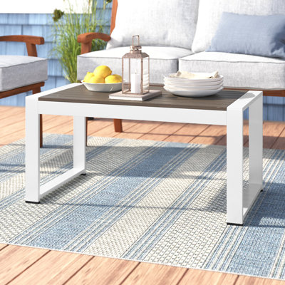 Aynura Plastic Coffee Table by Wade Logan