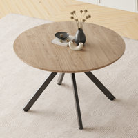 Saveta Round Solid Wood Dining Table by Latitude Run