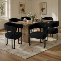 Haskett Upholstered Dining Armchair with metal legs by Orren Ellis