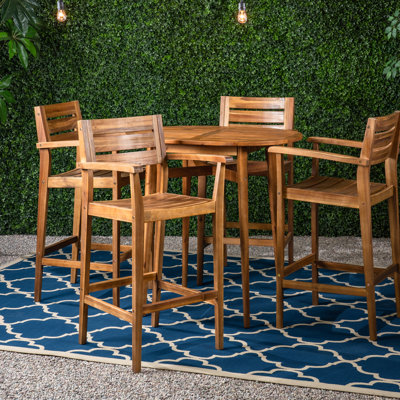 Carlleen 4 - Person Oval Outdoor Dining Set by Wade Logan