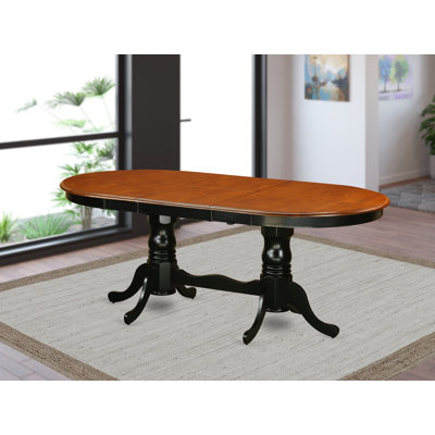 Pilcher Solid Wood Dining Table by August Grove