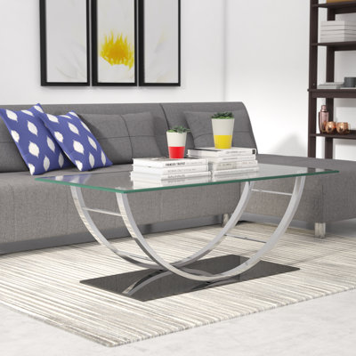 Nyvian Pedestal Coffee Table by Orren Ellis