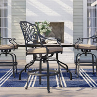 Lebanon Swivel 26" Patio Bar Stool with Cushion by Three Posts