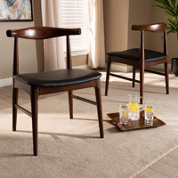Southerland Solid Wood Ladder Back Dining Chair in Black by Ivy Bronx