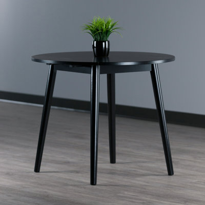 Conell 36" Round Drop Leaf Table Black Finish by Rosalind Wheeler