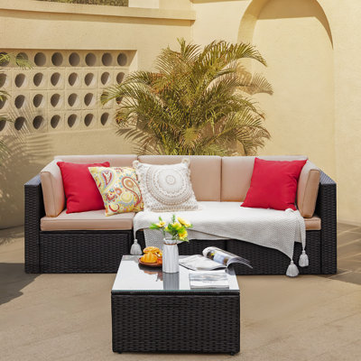 Atyia 4 Piece Rattan Sectional Seating Group with Cushions by Wade Logan