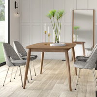 Charell Rubber Solid Wood Dining Table by Wade Logan