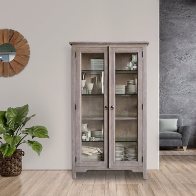 Tarrance Curio Cabinet by August Grove