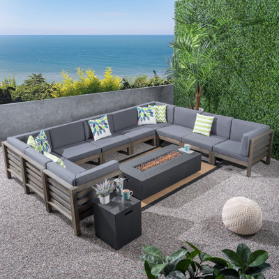 Ajanai Outdoor 12 Piece Sectional Seating Group with Cushions