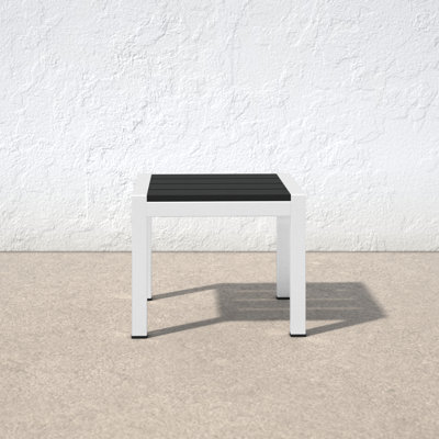 Aynura Plastic/Resin Side Table by Wade Logan