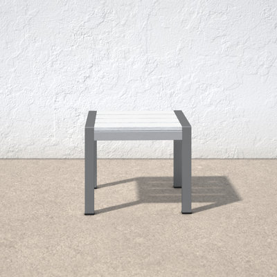 Aynura Plastic/Resin Side Table by Wade Logan