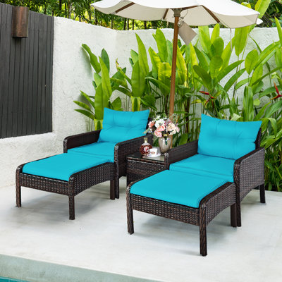 Choudhury 5 Piece Rattan Seating Group with Cushions