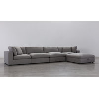 Albirta 134" Wide Reversible Modular Corner Sectional with Ottoman by Wade Logan