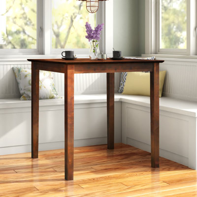 Counter Height Rubberwood Solid Wood Dining Table by Winston Porter