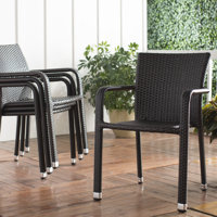 Tanishi Outdoor Stacking Dining Armchairs by Red Barrel Studio