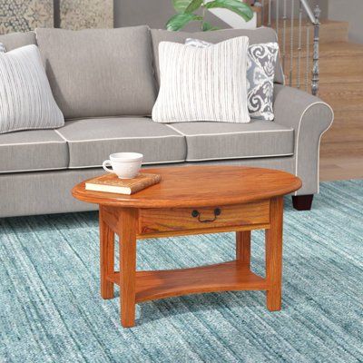 Oval Solid Wood Coffee Table by Charlton Home