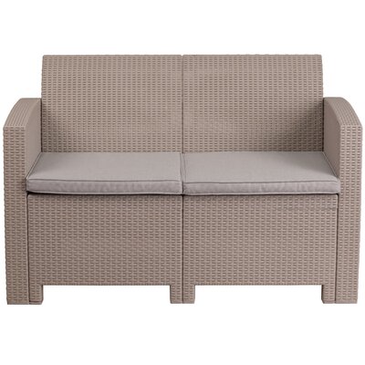 Alderman Faux Rattan Loveseat with All-Weather Cushions by Beachcrest Home
