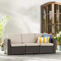 Alderman Faux Rattan Sofa with All-Weather Cushions by Beachcrest Home