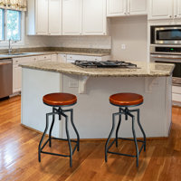 Korede Swivel Metal Adjustable Height Bar Stool by Williston Forge