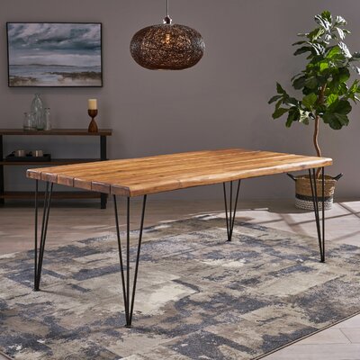 Vikesha Solid Wood Dining Table by Union Rustic
