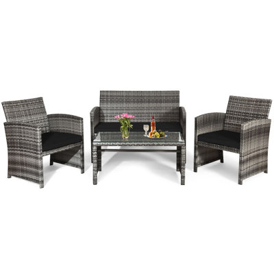 Akshath 4pcs Patio Rattan Furniture Conversation Set With Glass Table Top And Cushions