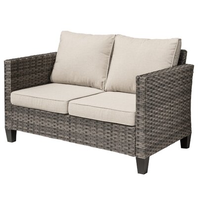 Lovall Wicker/Rattan Outdoor Loveseat With Cushions by Ebern Designs