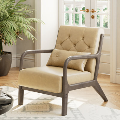 Alcie 25.79" W Tufted Faux Leather Upholstered Armchair with Wooden Armrests & Legs and Pillow by Wade Logan