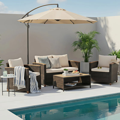 Arlington Vintage Woven Wicker/Rattan 4 - Person Seating Group with Solid Wood Table