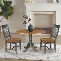 Dugazon Drop Leaf Solid Wood Dining Set by August Grove