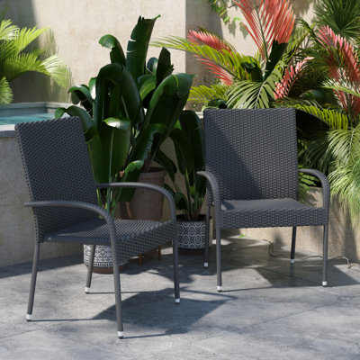 Emmoni Indoor/Outdoor Stacking Steel Framed Wicker Dining Armchairs by Red Barrel Studio