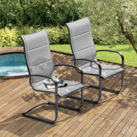 Nevan C-spring Outdoor Motion PVC-Coated Polyester Dining Chairs with Foam-Padded and Iron Chair Frame by Bay Isle Home