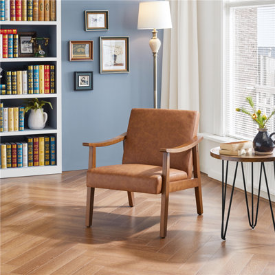 Asmat 24.5" W Mid-Century Modern Faux Leather Armchair with Solid Wood Legs by Wade Logan