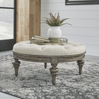 Aisja Upholstered & Tufted Round Cocktail Ottoman by Lark Manor