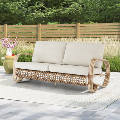 Sahay 66" Wide Outdoor Loveseat with Cushions by Bay Isle Home