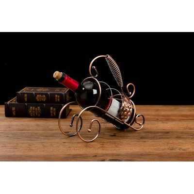 Joakima 1 Bottle Tabletop Wine Bottle Rack in Copper