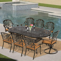 Risingsun Oval 8 - Person 83.8" Long Dining Set with Cushions