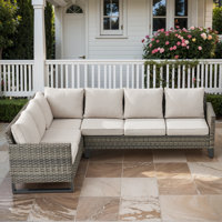 Nazime 105.1" Wide Outdoor Wicker Patio Sectional with Cushions by Latitude Run