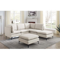 Cheryal 123" Wide Reversible Modular Sofa & Chaise with Ottoman by Wade Logan